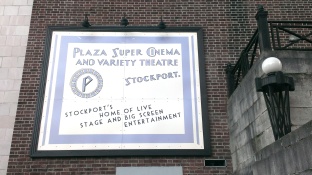 Sign on the side of the Plaza building