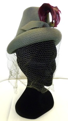 STOPM: 2013.30.1 - Hat with veil and feather, part of the Dover line by Henry Pollak Inc. of New York